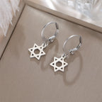 Pendientes colgantes para mujer con la <span data-glossary-id="etoile-de-david">estrella de David</span> simbólica judía de plata