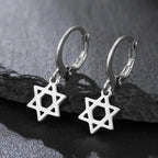 Pendientes colgantes para mujer con la <span data-glossary-id="etoile-de-david">estrella de David</span> simbólica judía de plata