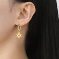 Pendientes colgantes para mujer con la <span data-glossary-id="etoile-de-david">estrella de David</span> simbólica judía de oro