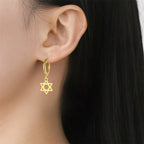 Pendientes colgantes para mujer con la <span data-glossary-id="etoile-de-david">estrella de David</span> simbólica judía de oro