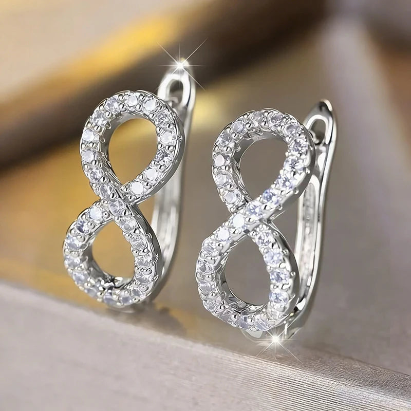 Sparkling infinity symbol drop earrings silver