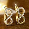 Sparkling infinity symbol drop earrings gold