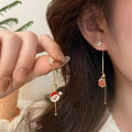 Pendientes de Papá Noel y Regalo
