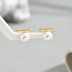 Pendientes de perla con barra geométrica