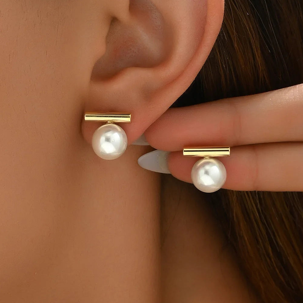 Pendientes de perla con barra geométrica