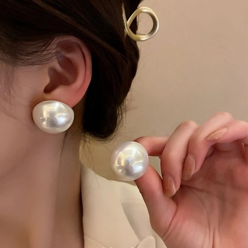 Pendientes de perla botón gigante