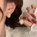Pendientes de perla geométrica oro