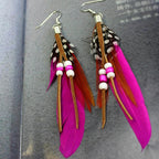 Pendientes de plumas estilo Apaches fucsia