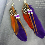 Pendientes de plumas estilo Apaches violeta