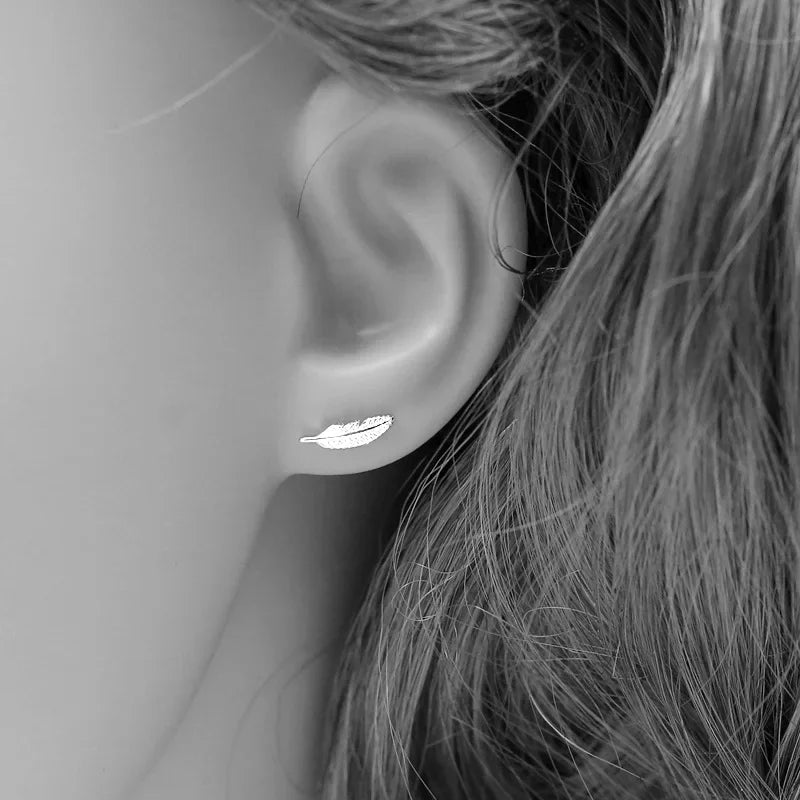 Pendientes de botón pluma