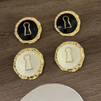 Pendientes redondos llave 