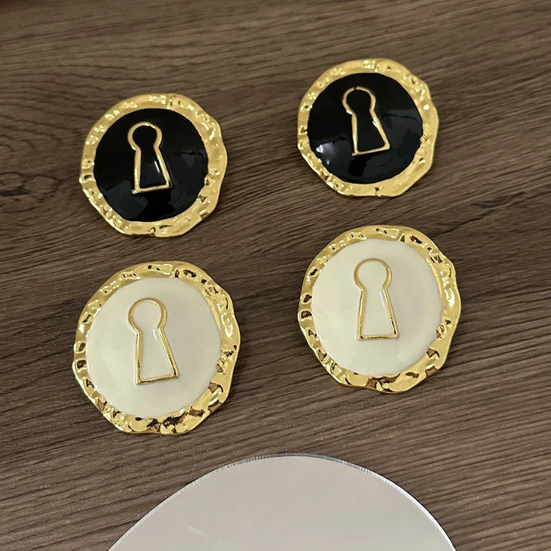 Pendientes redondos llave 