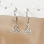 Pendientes de aro llave y candado con strass plateado