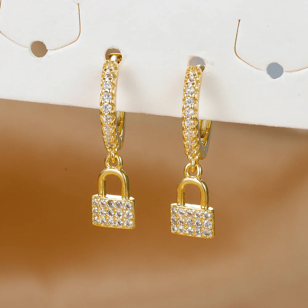 Pendientes de aro llave y candado con strass dorado