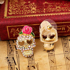 Pendientes de calavera Calavera con strass, rosa y ojos en forma de corazón