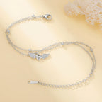 Pulsera ajustable alas de ángel plateada
