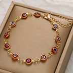 Adjustable blue and red evil eye bracelet