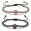Beaded cord bracelet with mystical rhinestone skull in silver