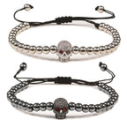 Beaded cord bracelet with mystical rhinestone skull in silver
