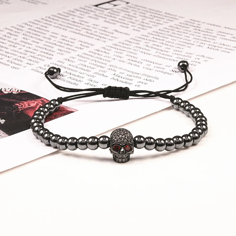 Beaded cord bracelet with mystical rhinestone skull in black