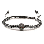 Beaded cord bracelet with mystical rhinestone skull in black