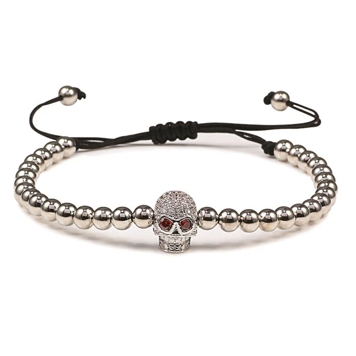 Beaded cord bracelet with mystical rhinestone skull in silver