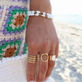 Pulsera con concha Cauri y perlas