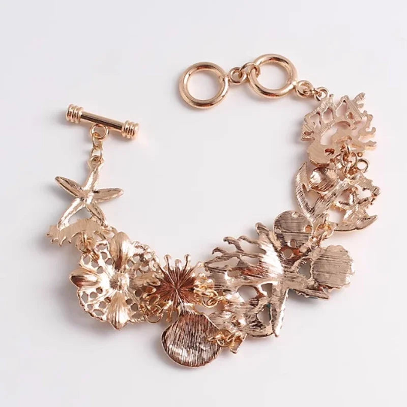 Pulsera con conchas de color rojo