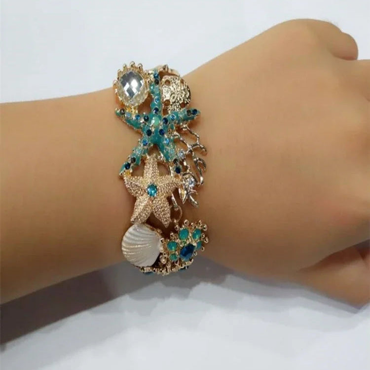 Pulsera con conchas de color azul