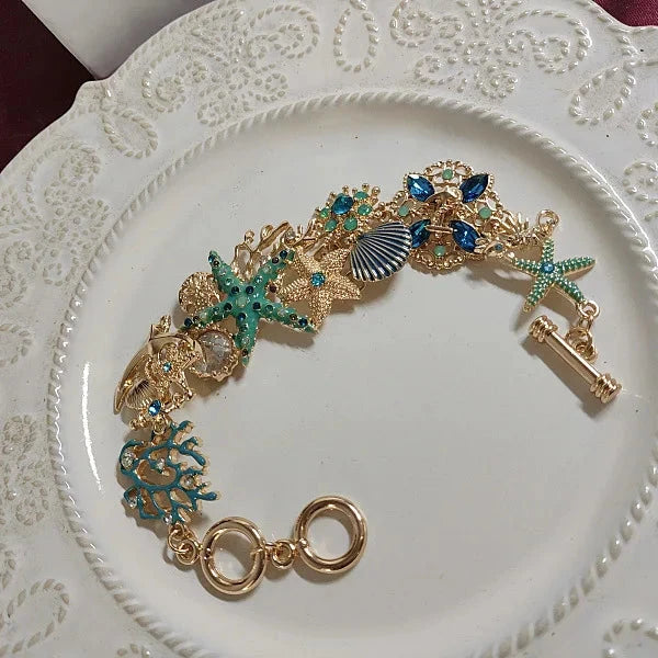 Pulsera con conchas de color azul