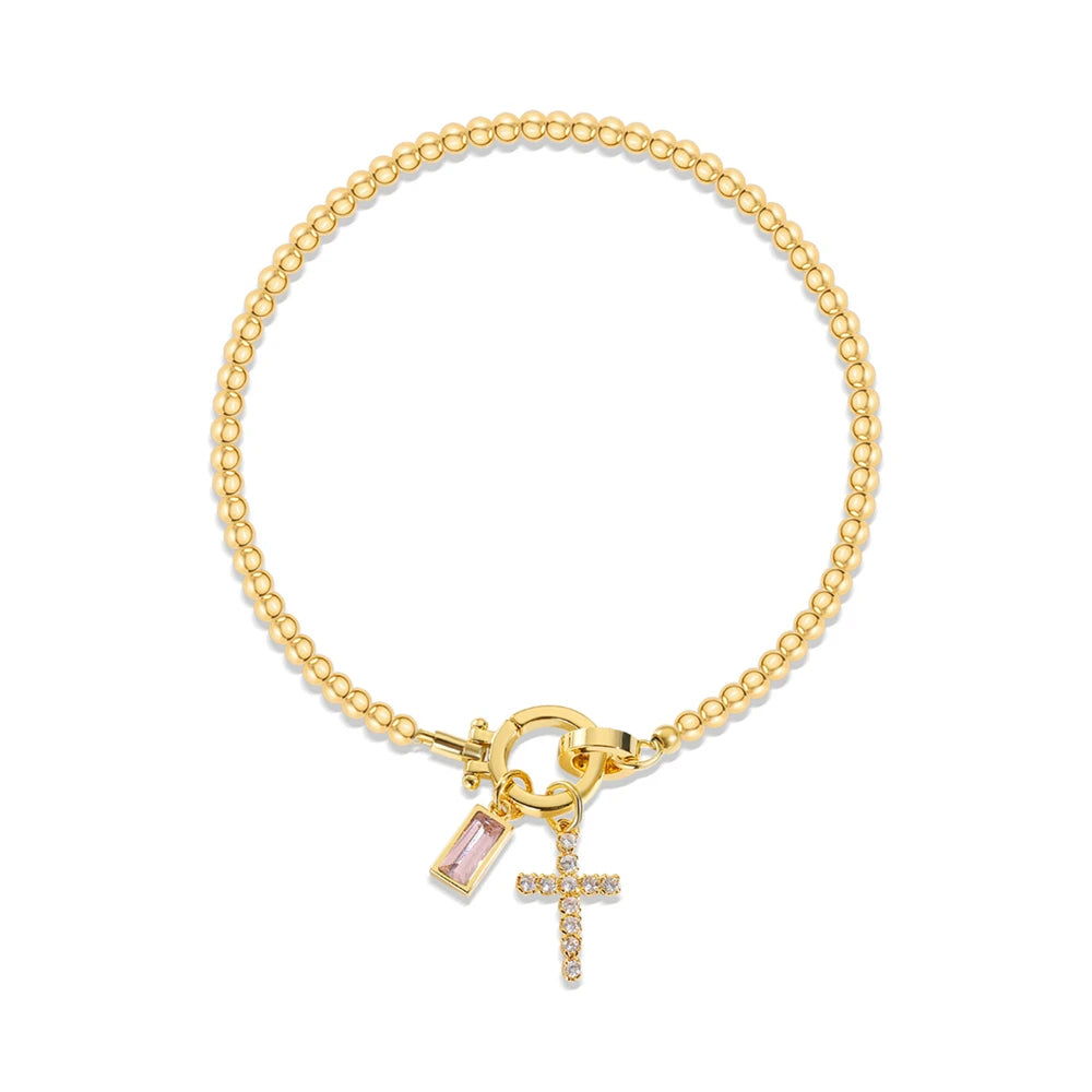 Pulsera con cruz y piedra de nacimiento