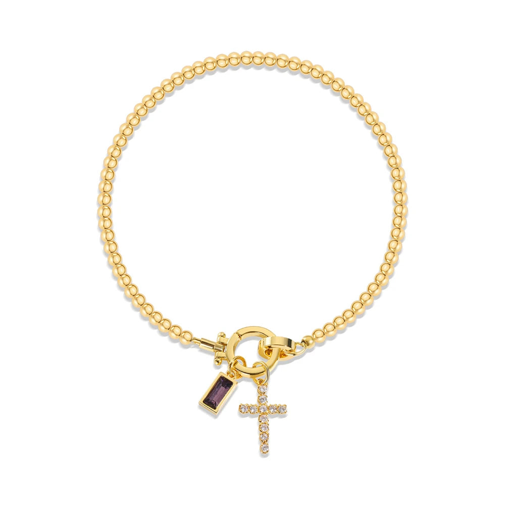Pulsera con cruz y piedra de nacimiento