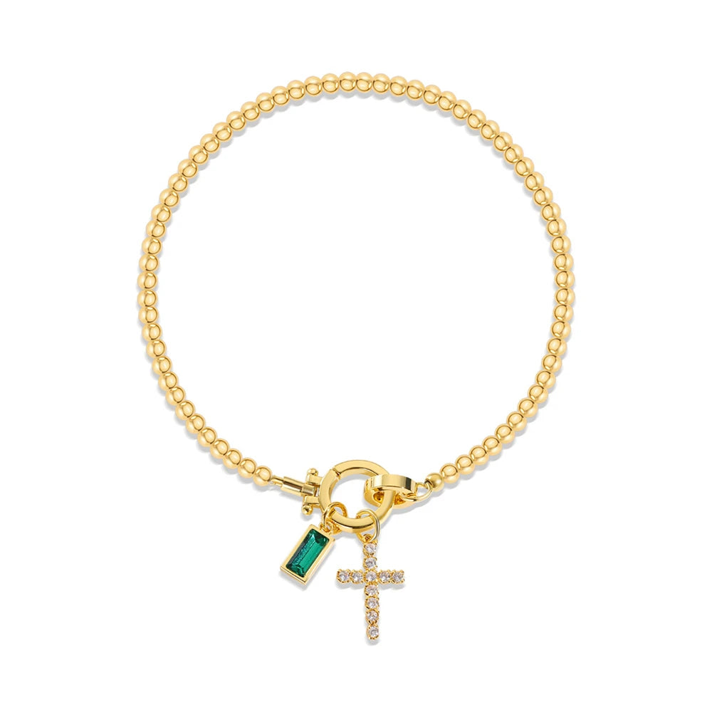 Pulsera con cruz y piedra de nacimiento
