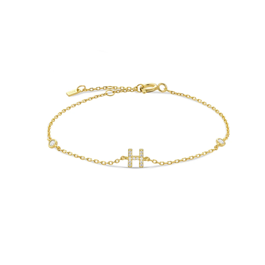 Pulsera con inicial de strass dorado h