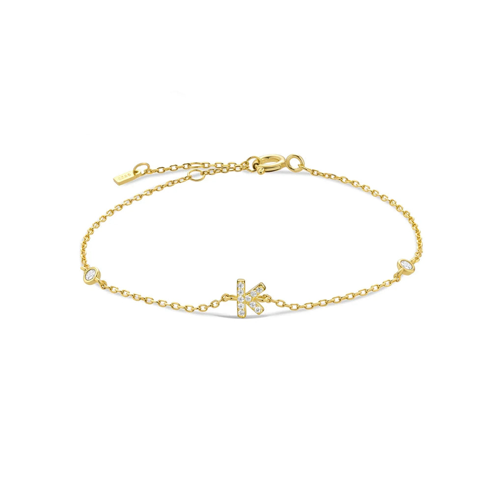 Pulsera con inicial de strass dorado k