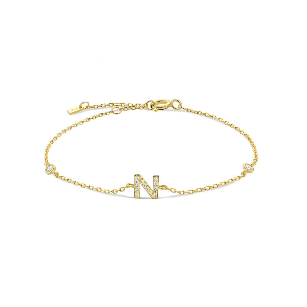 Pulsera con inicial de strass dorado n