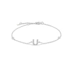 Pulsera con inicial de strass plateado u