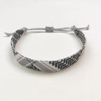 Pulsera con motivos geométricos Keffiye árabe gris