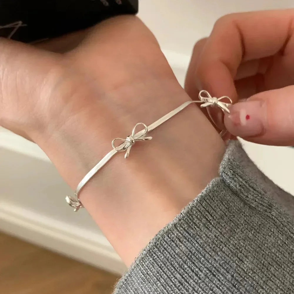 Pulsera con lazo de pajarita para  mujer plata


