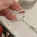 Pulsera con lazo de pajarita para mujer plata