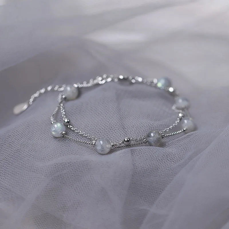Pulsera con cuentas de piedra luna de reflejos irisados