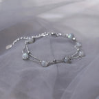 Pulsera con cuentas de piedra luna de reflejos irisados