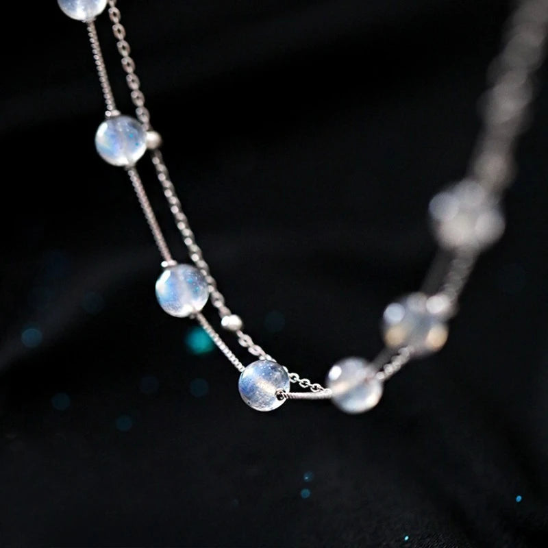 Pulsera con cuentas de piedra luna de reflejos irisados