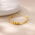 Pulsera con Perlas Giratorias Antiestrés para Hombre o Mujer oro