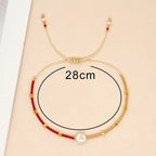 Pulsera bicolor inicial