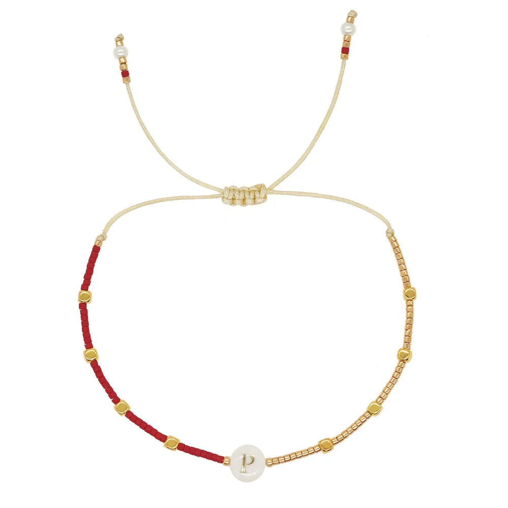 Pulsera bicolor inicial p