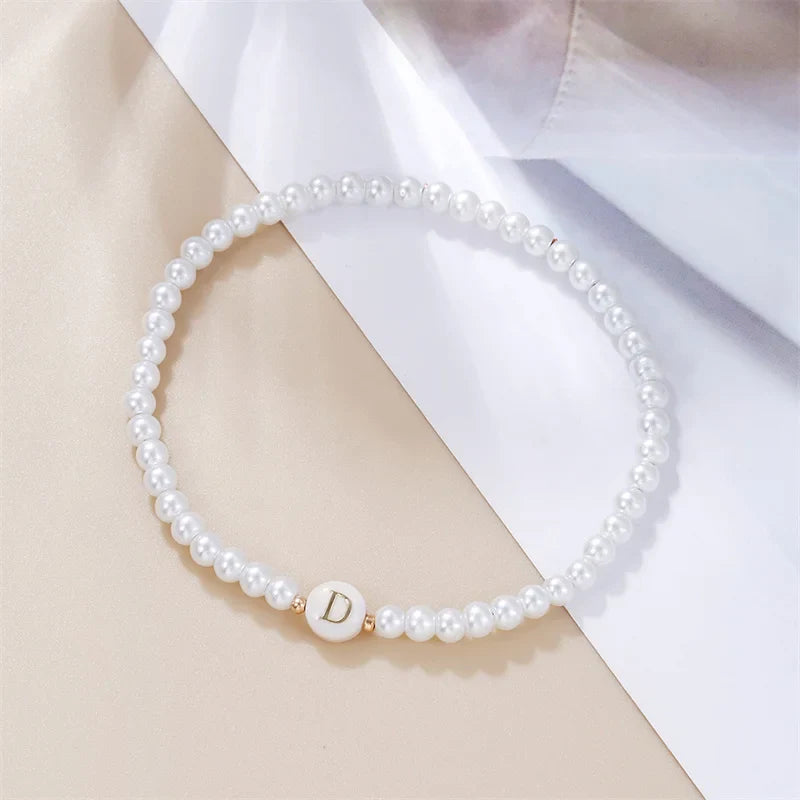 Pulsera blanca inicial d