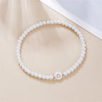 Pulsera blanca inicial o