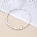 Pulsera blanca inicial a