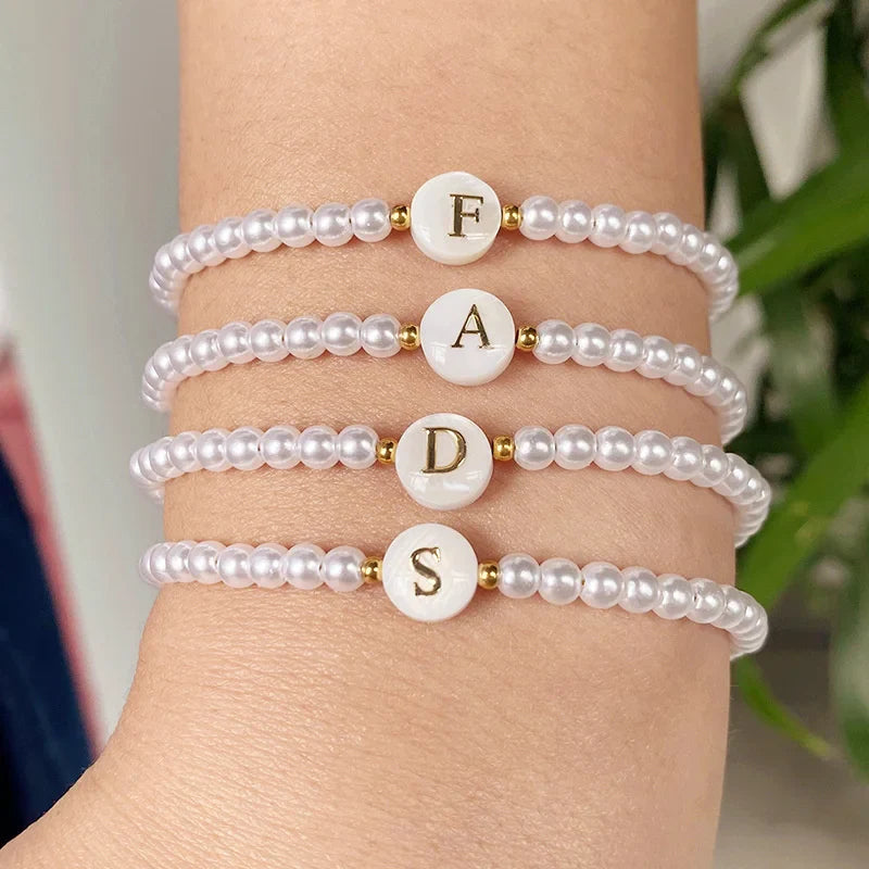 Pulsera blanca inicial s